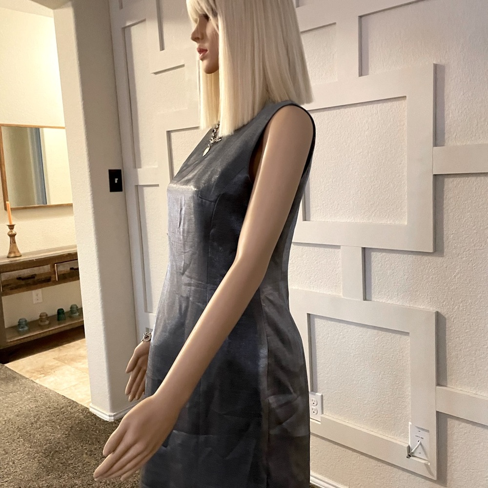 A classic kasper metallic grey dress you can wear to any occasion brand new.